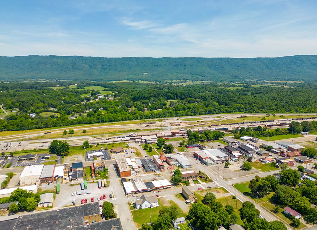 Dickson, TN - Aerial view of homes in Tennessee with hills and mountains